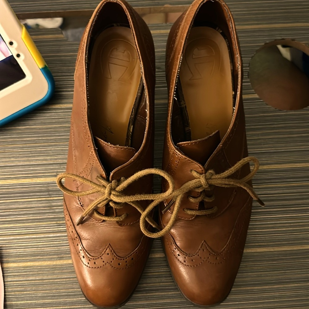 Etienne Aigner Leather